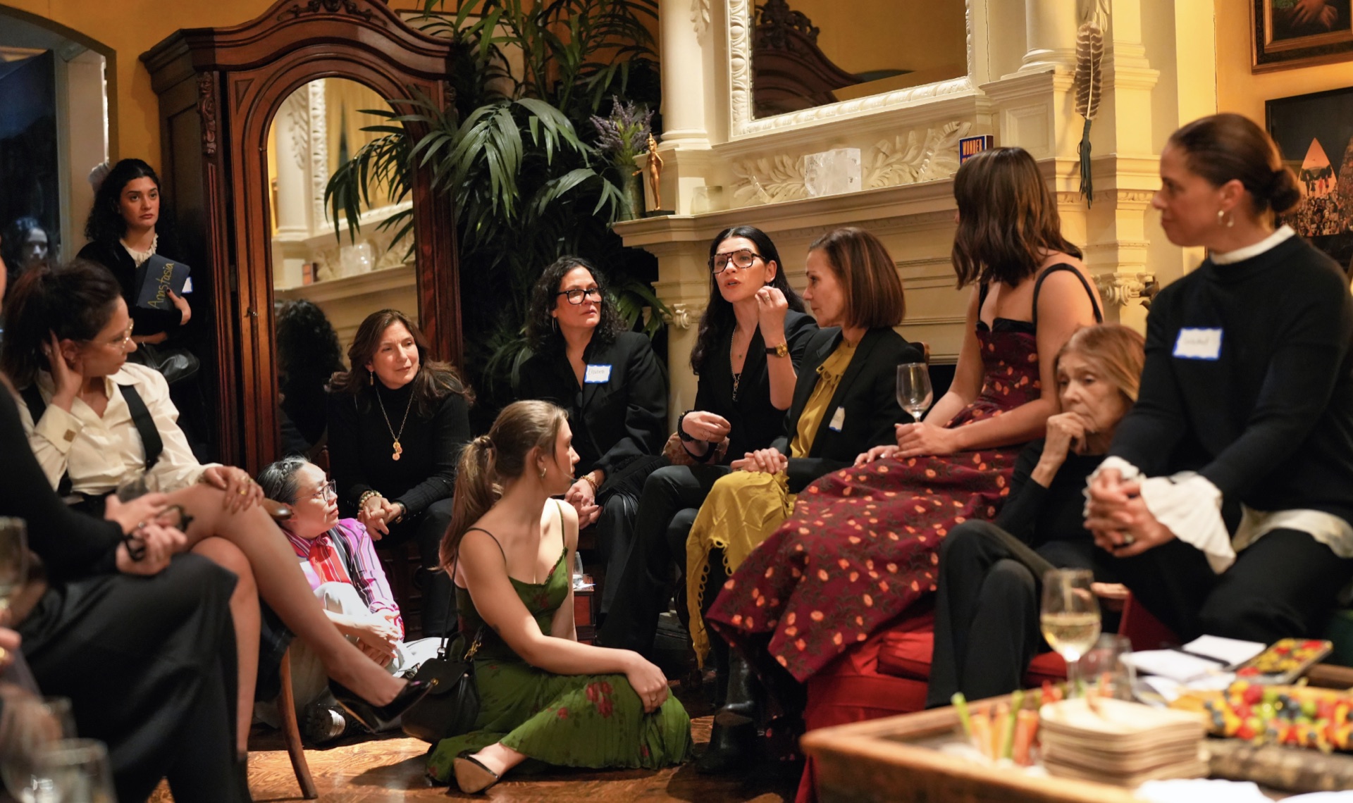 Women seated together in conversation at a Summer Willis Foundation gathering